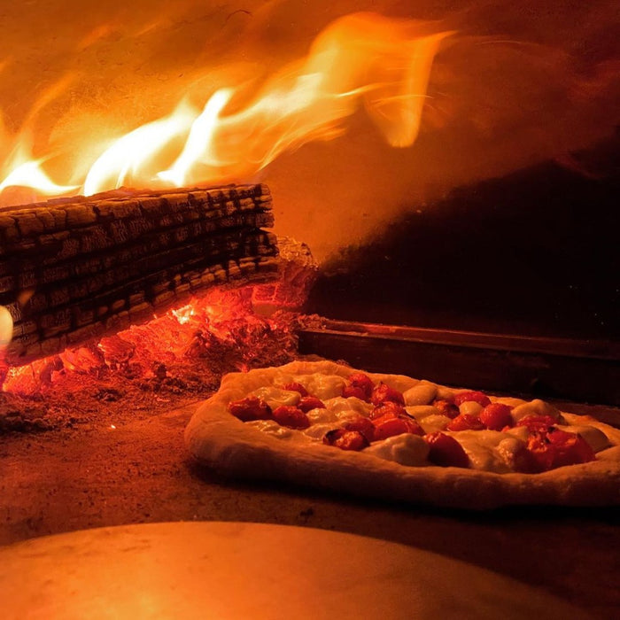 Pizza in Wood Fired Oven with Flames_Chicago Brick Oven 500 or 750 or 1000