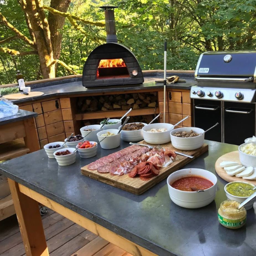 Authentic pizza oven with food table