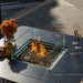 Elementi Plus Brugge Dining Fire Table with flame and windscreen
