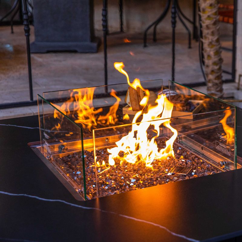 Elementi Plus Brugge Dining Fire Table With windscreen and flame closer view