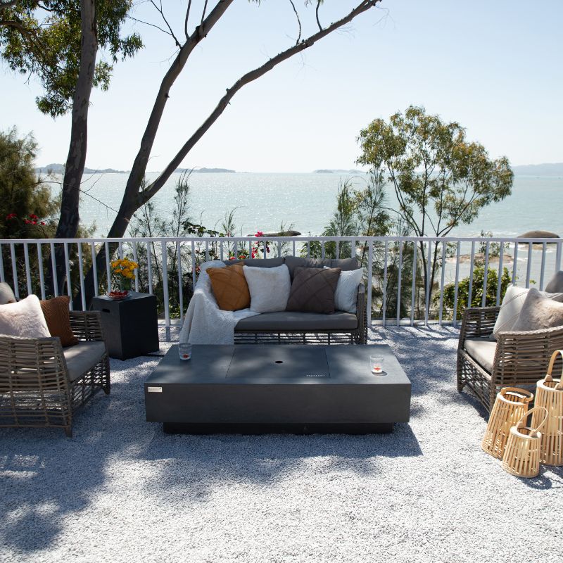 Elementi Plus Cannes Fire Table with Aluminum lid cover backyard set up