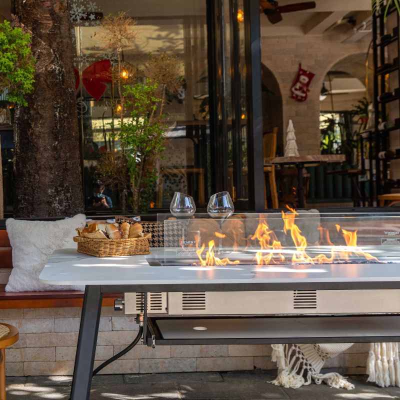 Elementi Plus Oslo Dining Fire Table with flame and windscreen Commercial Use