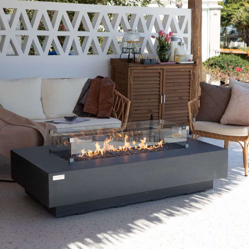 Elementi Plus Positano Fire Table outdoor with flame and sofa