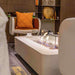 Elementi Sydney ethanol fire Pit Cream white with flame indoor set up