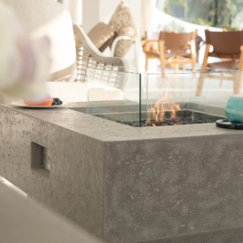 Gray Manhattan Ethanol Fire Table with flame and windscreen outdoor