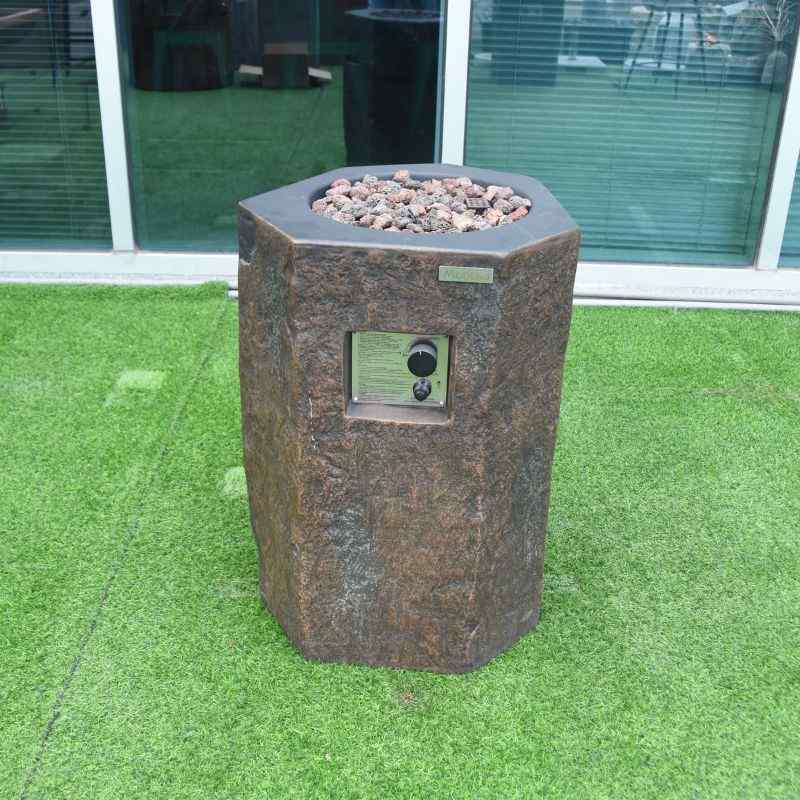Modeno Basalt Column Fire Pit Front angle on the grass
