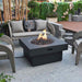 Modeno Branford Fire Table Dark gray with Flame and couch backyard set up