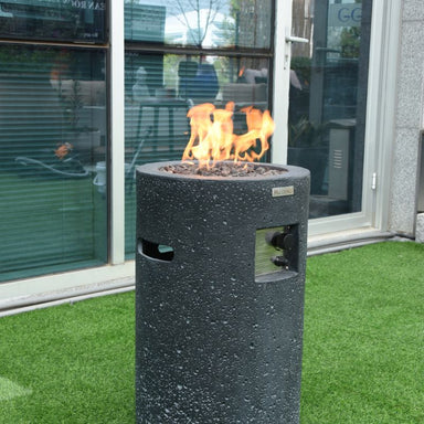 Modeno Lava Tube Fire Pit Angle with Flame backyard with grass