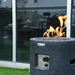 Modeno Lava Tube Fire Pit Set up with flame backyard