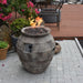 Modeno Pompeii Fire Pit with flame backyard Set Up