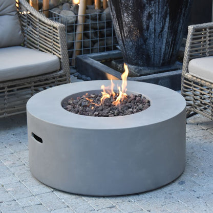 Modeno Tramore Fire Table with Flame set Up near couch