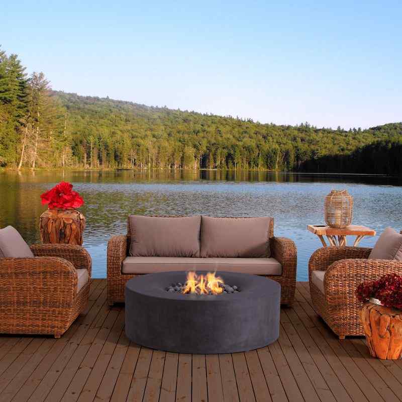 Pyromania Avalon Fire Table Charcoal with couch Lifestyle