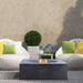 Pyromania Tao Fire Table Charcoal with flame and near the couch Outdoor Heating