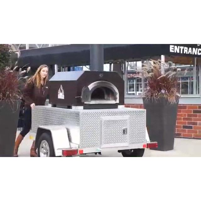 Woman pushing CBO 750 Tailgater
