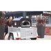 Woman pushing CBO 750 Tailgater