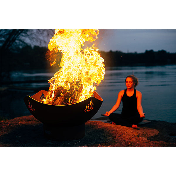 Fire Pit Art Namaste Fire Pit Burning with lady doing yoga at night