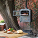  Nuke 60 Outdoor Pizza Oven - open with food, far view